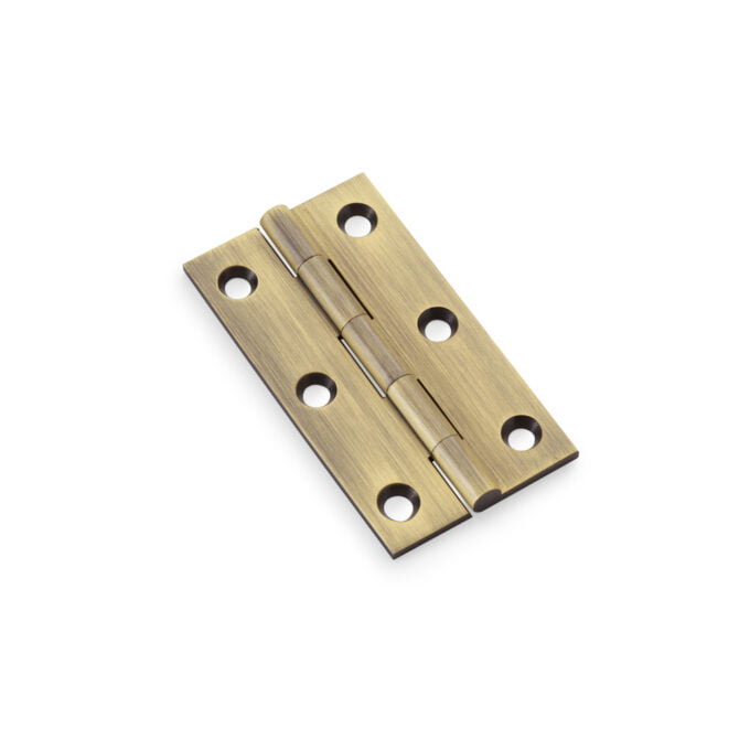 Brass door hinge isolated on white background.