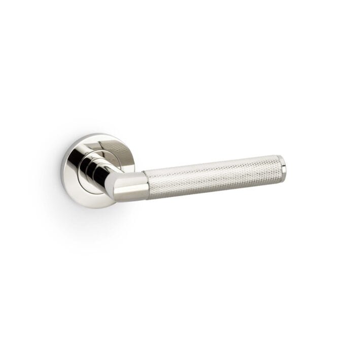 Chrome lever door handle on white background