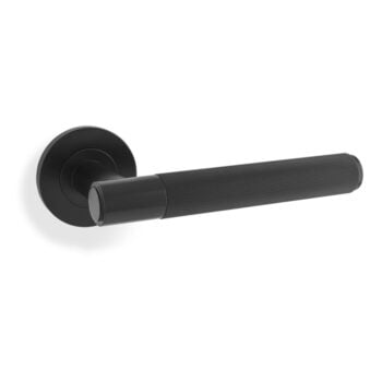 Black modern door handle on white background.