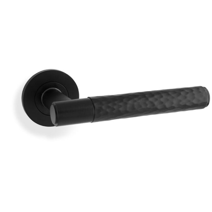 Black door handle with textured grip on white background.