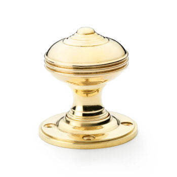 Gold vintage door knob isolated on white.