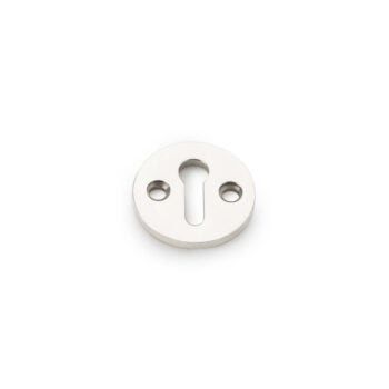 White keyhole plate on plain background