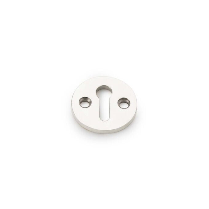 White keyhole plate on plain background