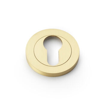 Gold keyhole cover on white background