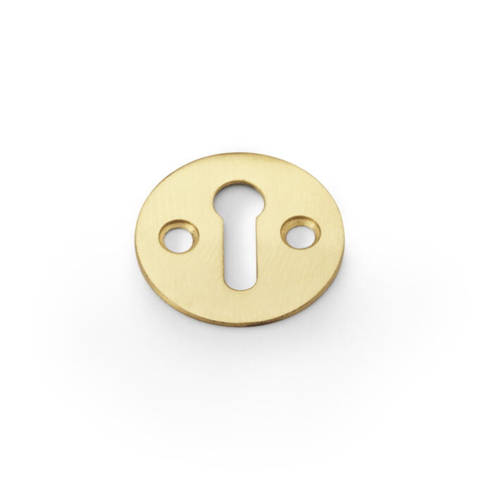 Gold keyhole cover on white background