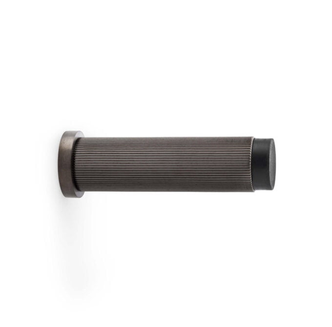 Black rubber bike handlebar grip on white background.