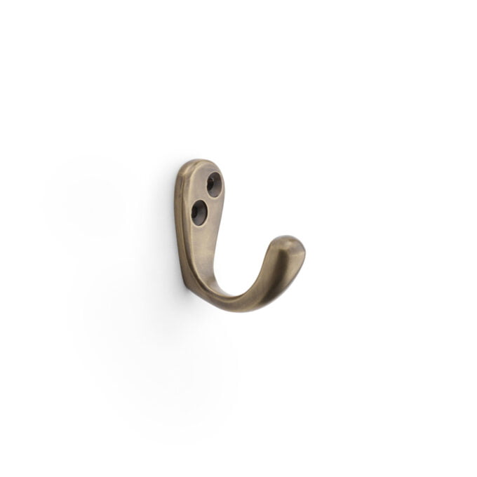 Antique bronze wall hook on white background