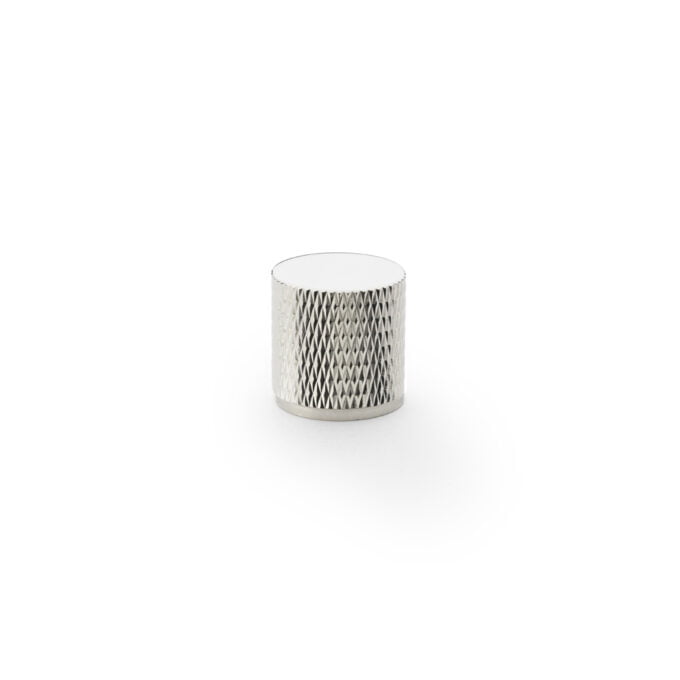 Silver textured cylindrical candle holder on white background