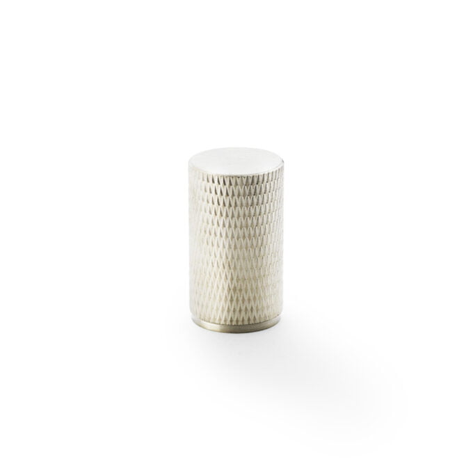 White textured ceramic cylinder on white background