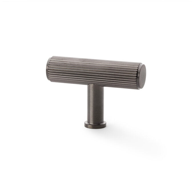 Metal ridged handle on white background