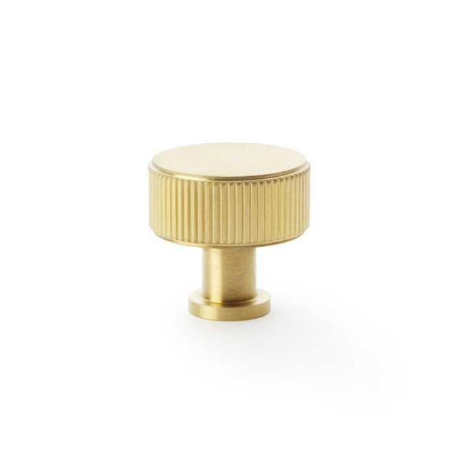 Brass cabinet knob on white background