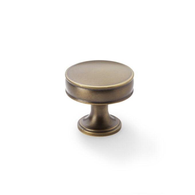 Antique bronze cabinet knob isolated on white background.