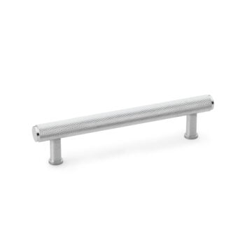 Stainless steel knurled grab bar on white background.