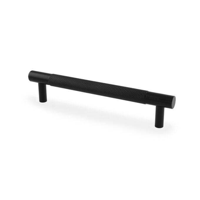 Black textured cabinet pull handle isolated on white.