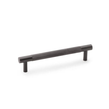 Black textured cabinet handle on white background.