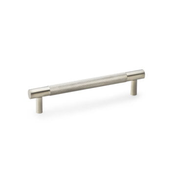 Brushed nickel cabinet handle on white background.