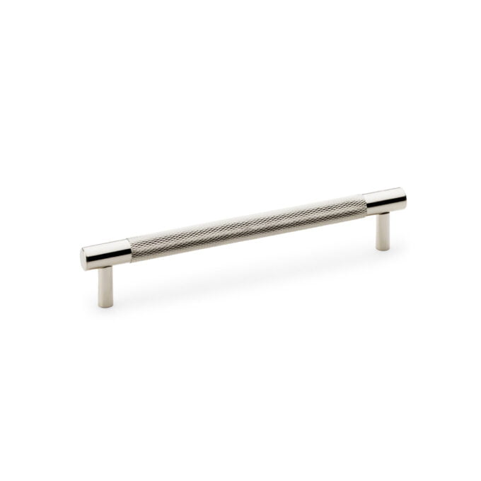 Chrome cabinet handle with textured grip on white background.