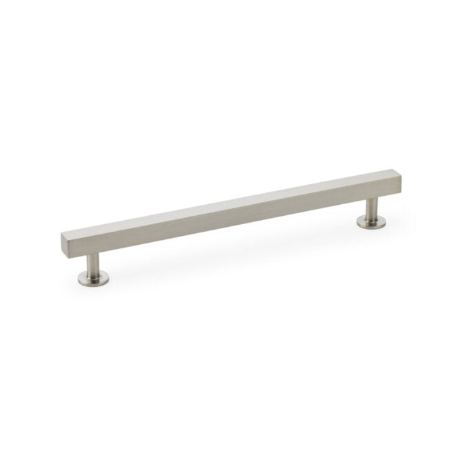 Sleek stainless steel cabinet handle isolated on white.