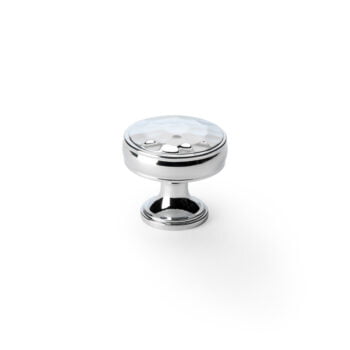 Chrome drawer knob on white background.