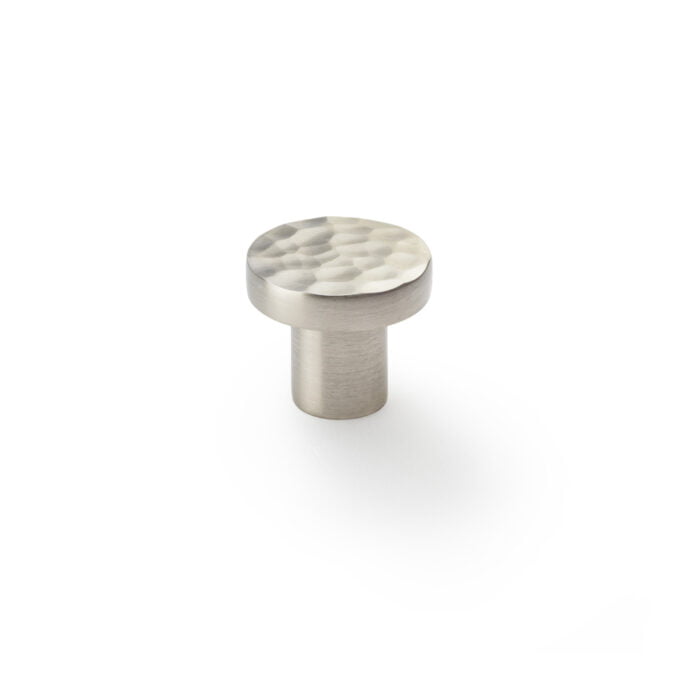 Brushed nickel cabinet knob with textured top