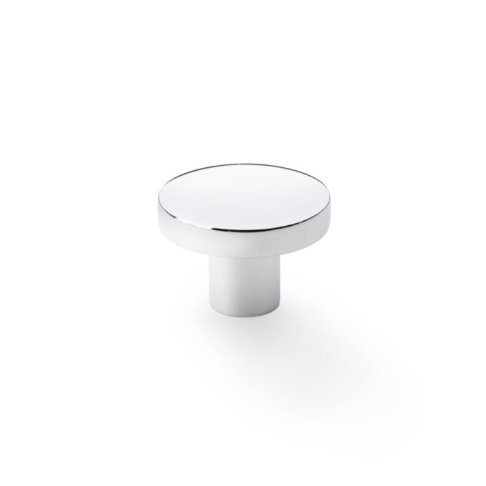 Polished chrome cabinet knob on white background.