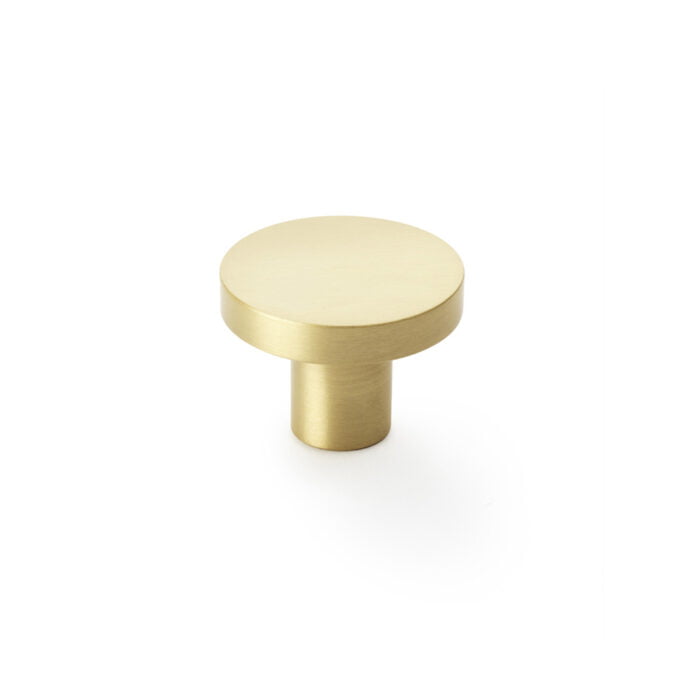 Gold cabinet knob on white background