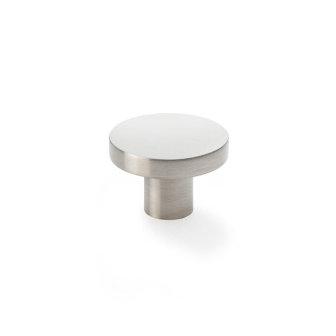 Brushed nickel cabinet knob on white background