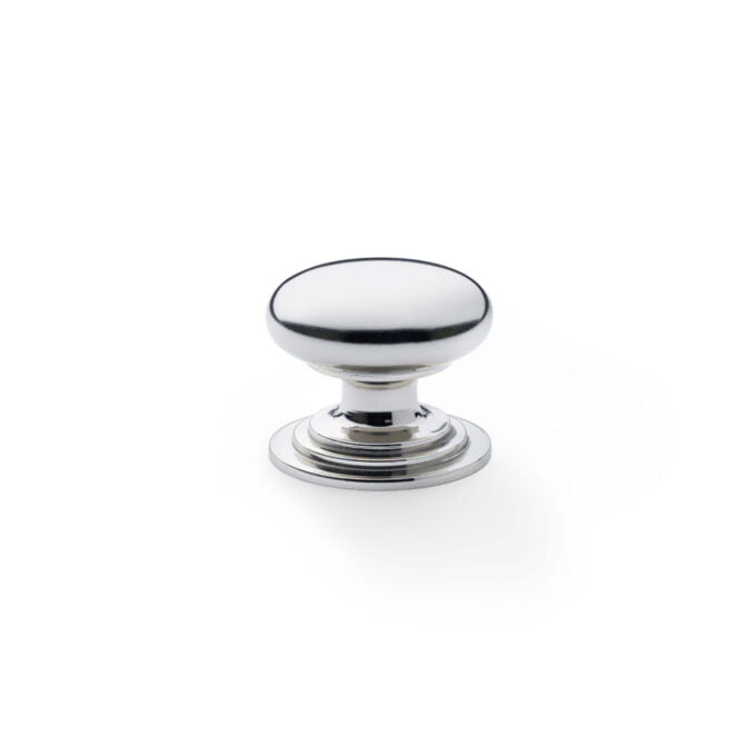 Polished chrome cupboard knob on white background.