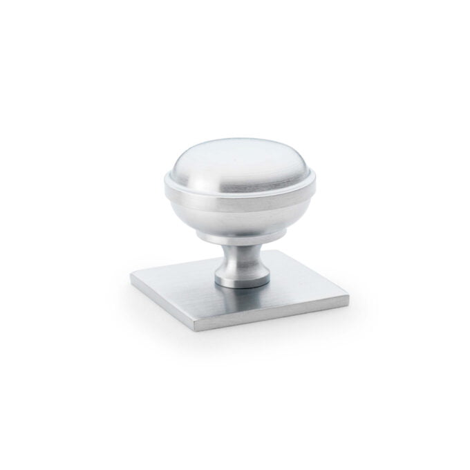 Stainless steel cabinet knob on white background