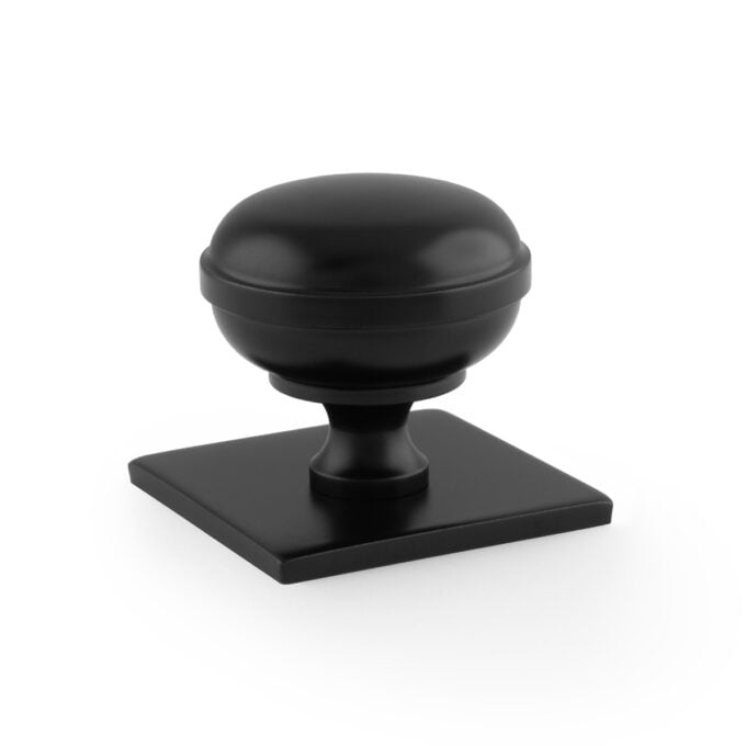 Quantock Cupboard Knob on Square Backplate - Black - 38mm Black cabinet knob on white background.