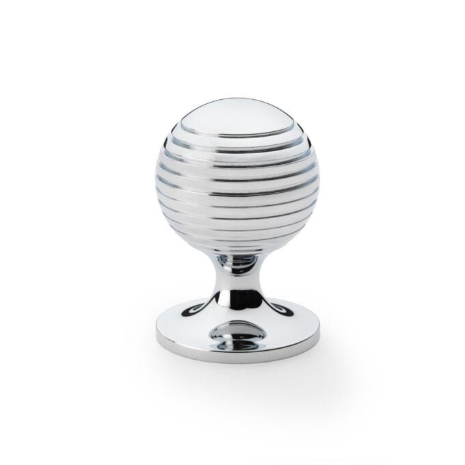 Chrome-striped egg cup on white background.