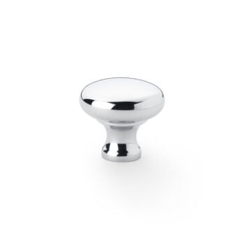 Shiny chrome cabinet knob on white background.
