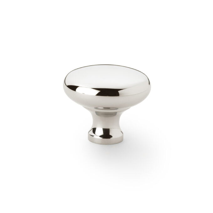 Polished chrome cabinet knob on white background.