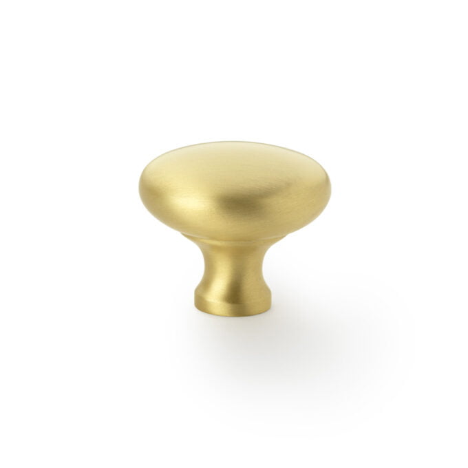 Gold cabinet knob isolated on white background.