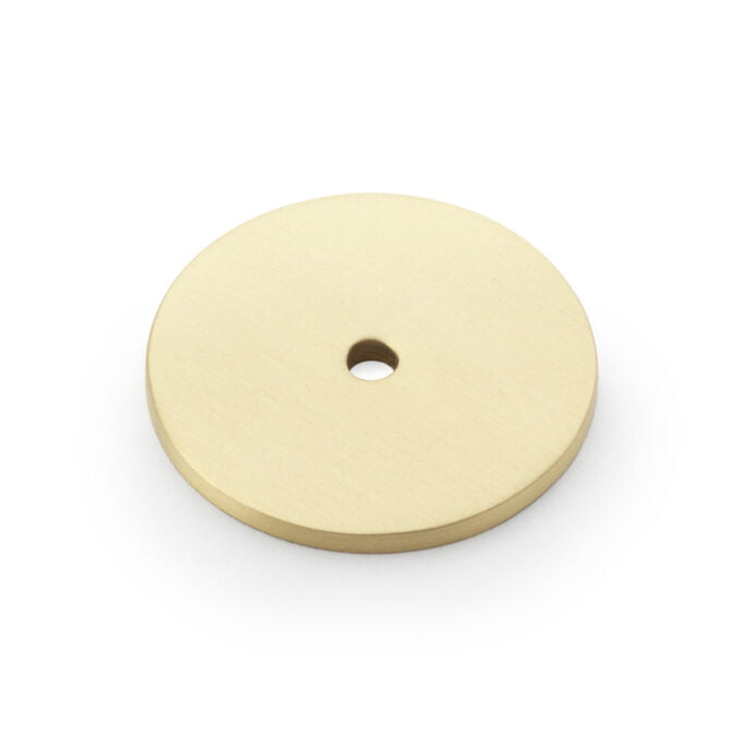 Gold-tone round metal disc with central hole