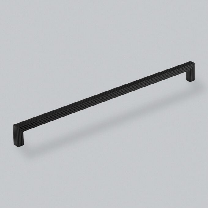 Black metal cabinet handle on white background.