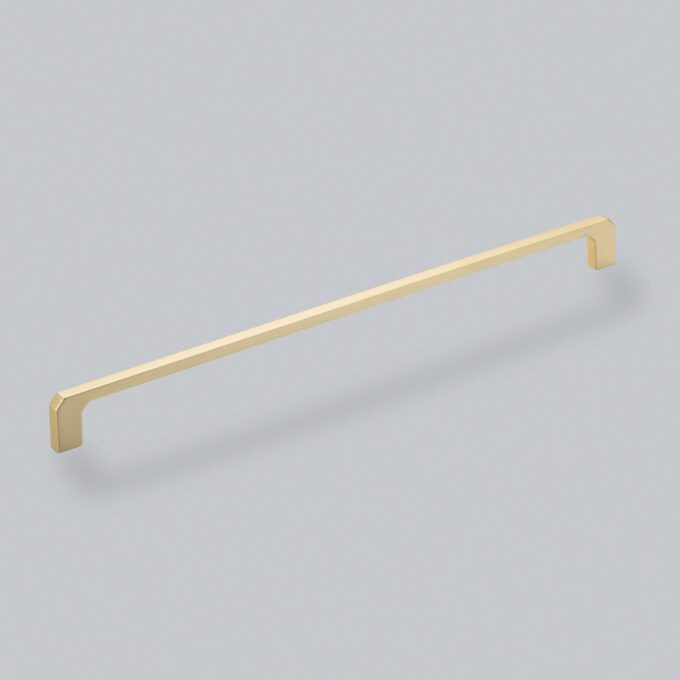 Gold handle on pale blue background