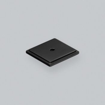 Black square button on grey background.