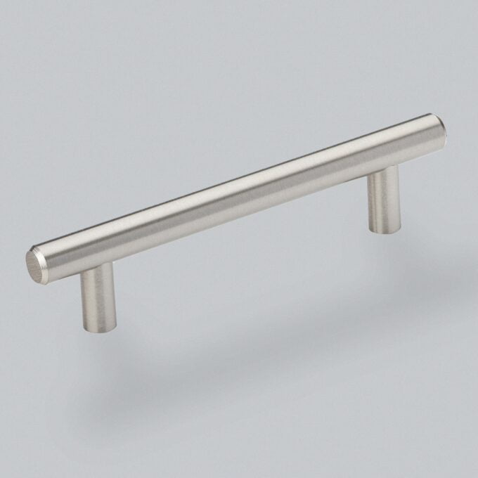 Stainless steel cabinet handle on grey background