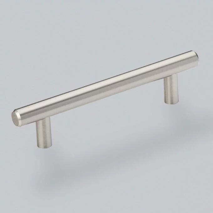 Stainless steel cabinet handle on grey background