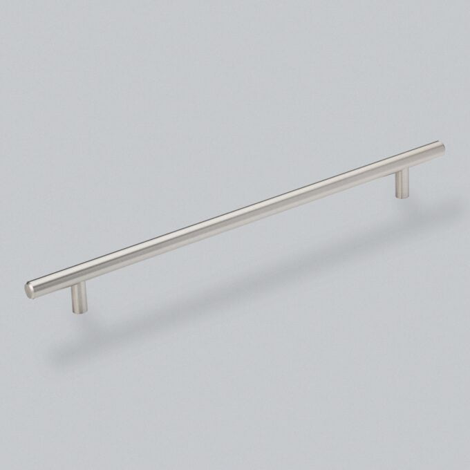 Stainless steel kitchen cabinet handle on white background.