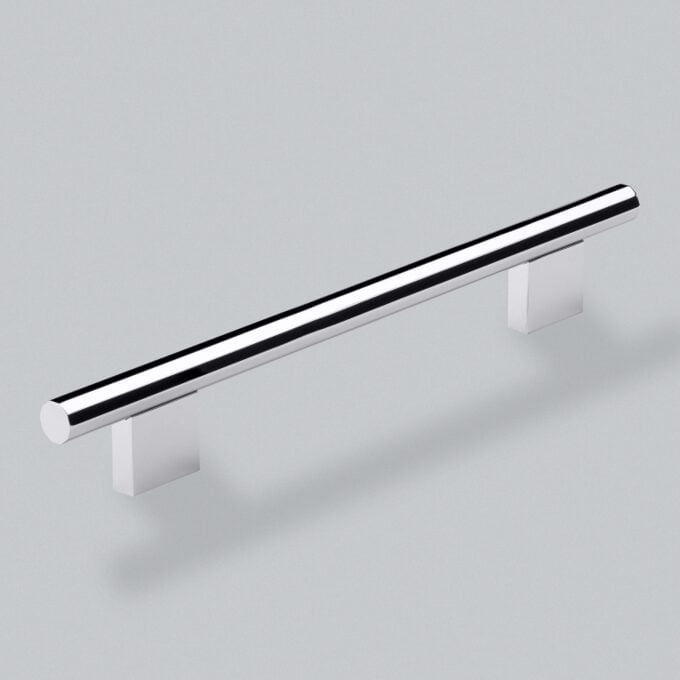 Chrome cabinet handle on grey background