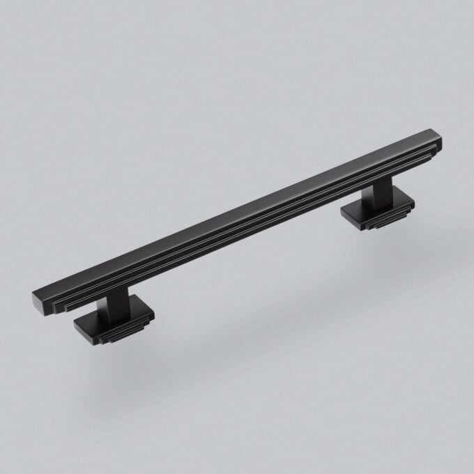 Black modern cabinet handle on white background.