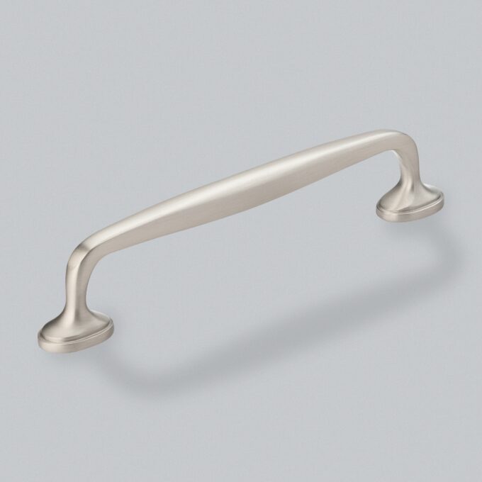 Stainless steel cabinet handle on a grey background.