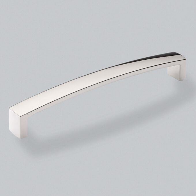 Sleek silver cabinet handle on light grey background