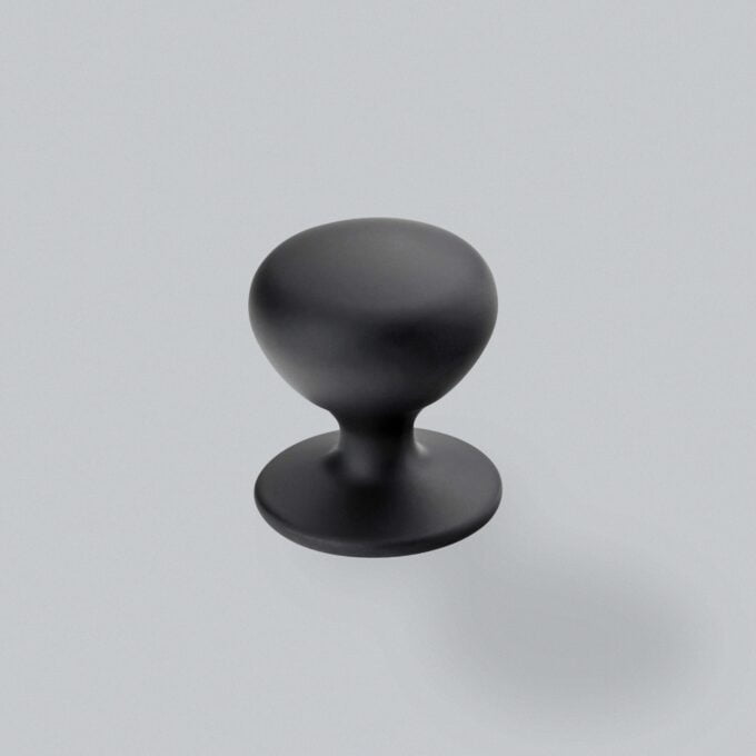 Black round stamp on white background.
