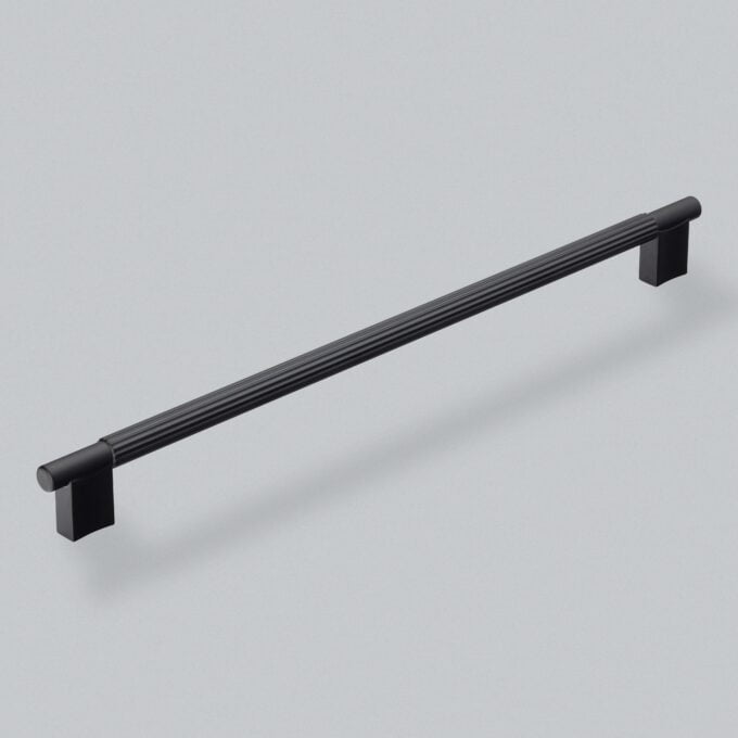 Black modern kitchen cabinet handle on grey background.