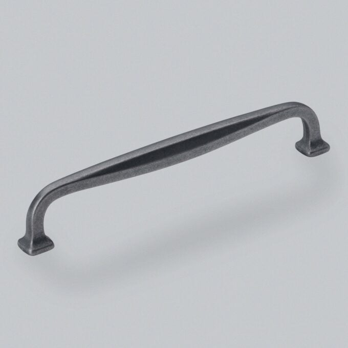 Black iron cabinet handle on white background.