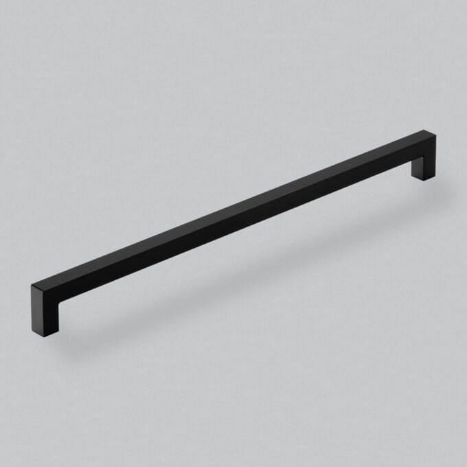 Black minimalist cabinet handle on grey background