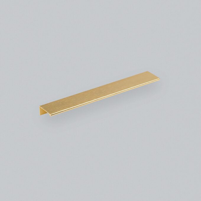 Gold metal bar on a grey background.